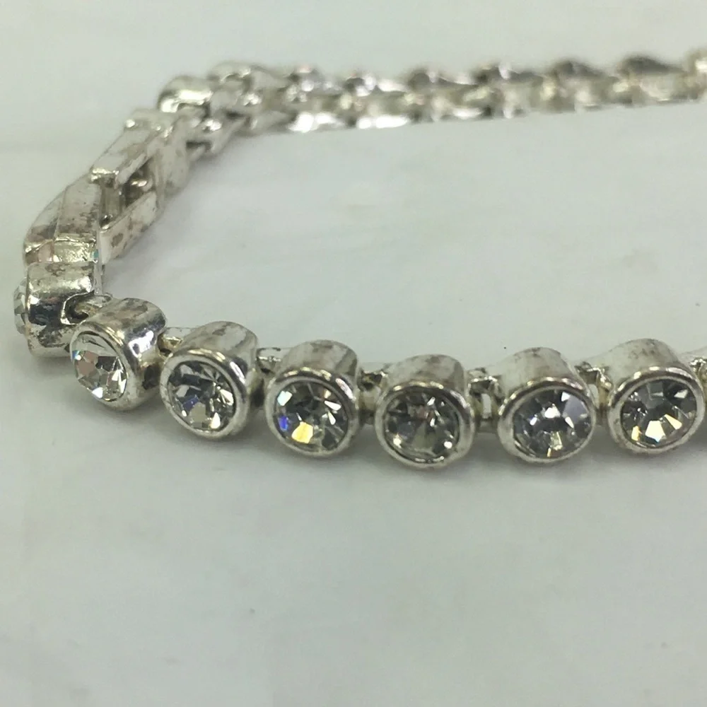 Cubic zirconia tennis bracelet silver tone 7.25” long - Picture 8 of 8